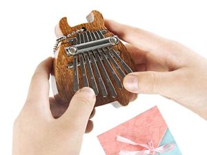 RIMLUFE cute mini kalimba tiny calimba mbira hand harp musical instruments marimba small portable finger thumb piano accessories for kids beginners piano instruments adults 8 key calming gifts